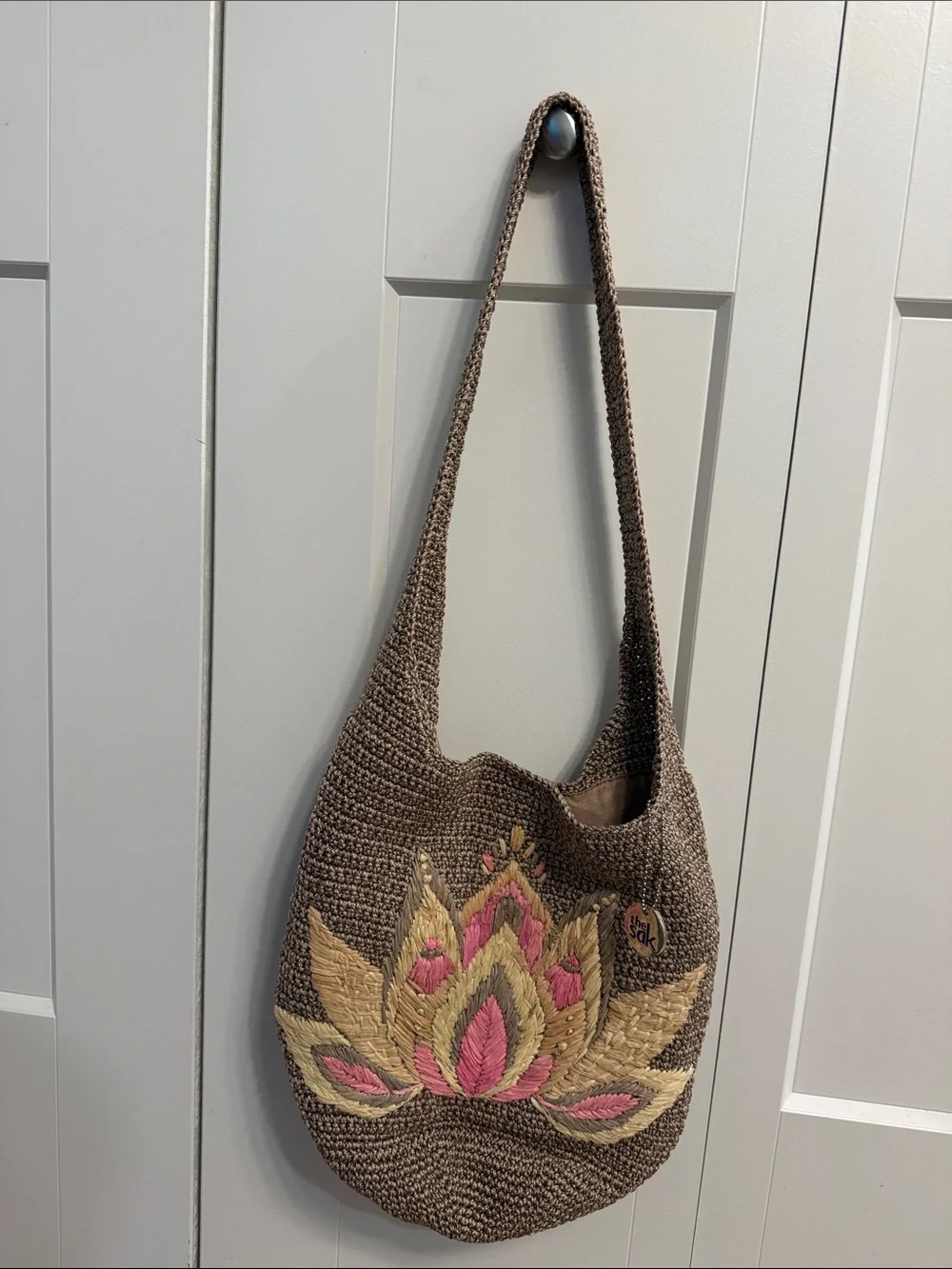 NWOT The Sak Hobo Handwoven Crochet Shoulder Bag with Pink Floral Embroidery